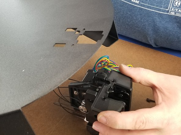 Put the small shim on the endstop side of the motor bracket as shown in Pic 2.  There is a  notch in the shim to allow the endstop switch to be not blocked.  Pay attention to this orientation.
