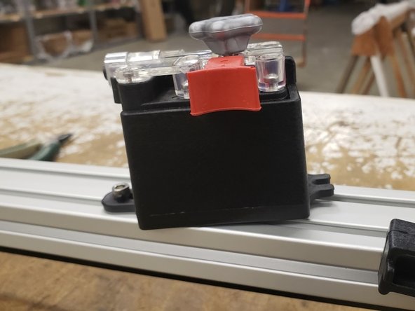 The assembly should be able to hang with the top tightened.