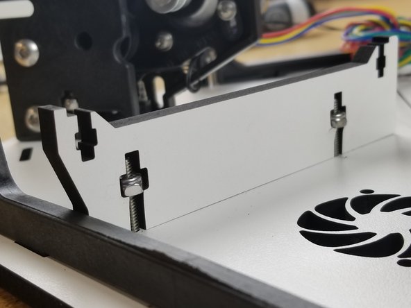 Install the board mounts so that the angled ledge hangs over the side panel. They should only install one direction.