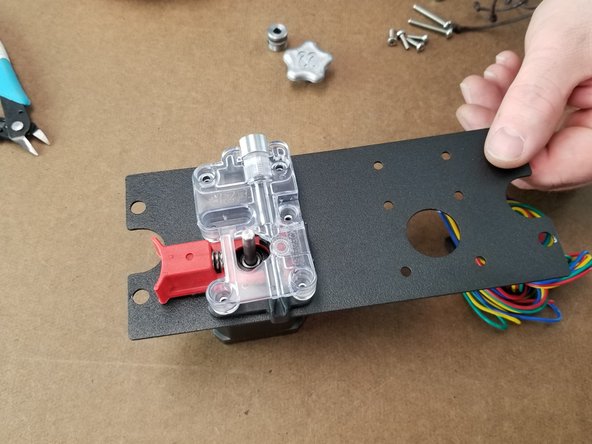 Place the extruder plate over the motor as shown in Pic 2.