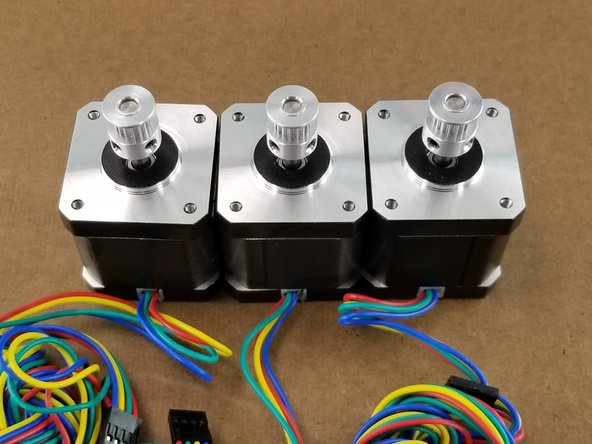 Tighten down both set screws on the motor making sure one of the set screws is aligned with the flat part of the motor shaft.