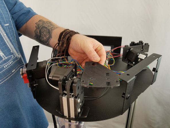 This step will install the 3 large shims for the upper motor brackets.