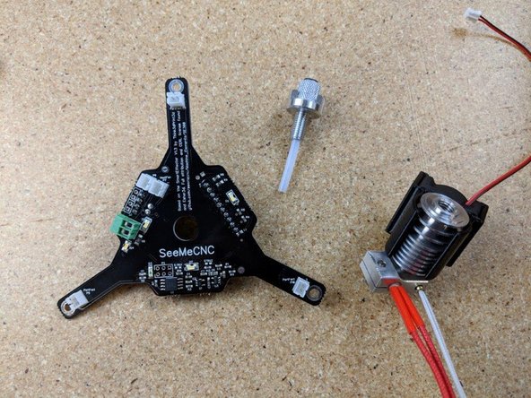 Locate the SE300 PCB,  knurled locking connector and small PTFE tube from the kit as shown in pic 3 for the next step.