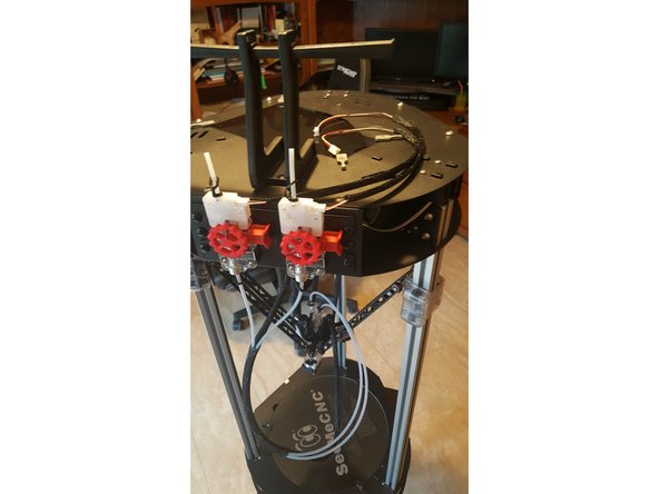 Just insert long peg, rotate and gently lift, and snap short peg into hole.