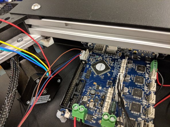 The hotend probe connector (4-pin red, blue, black, brown wires, exiting the X tower wire bundle) is keyed and will only connect in one direction in the location indicated in the photo.