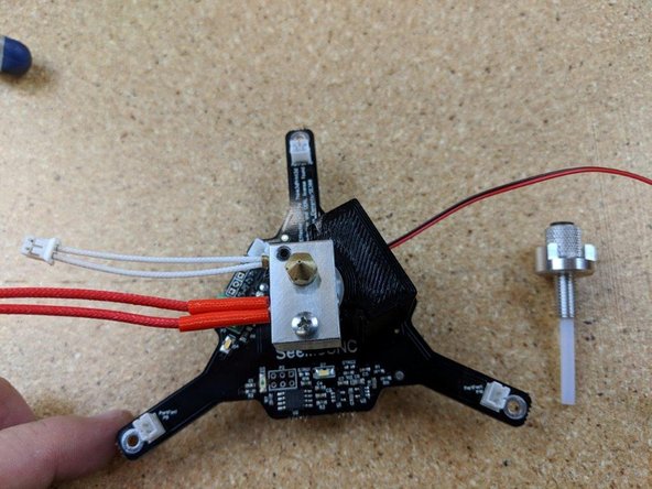Position the hotend on the hotened PCB as shown in pic1.  The fan will be under the 10 pin connector, and the wires for the thermistor and heater will  be  on the side with the green connector and 2 white connectors.