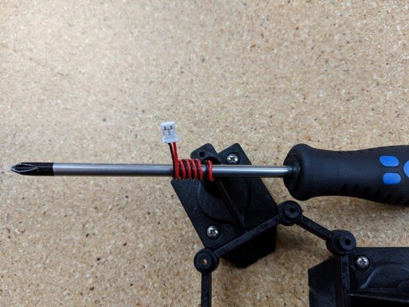 Be careful in this step not to pull on the blower fan wires as they can be damaged if pulled on.