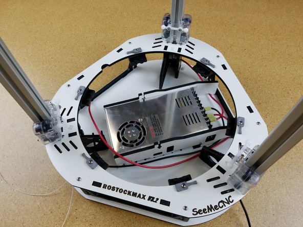 To install the carriages pass the wires from the top of the TSLOT through the center of the carriage.