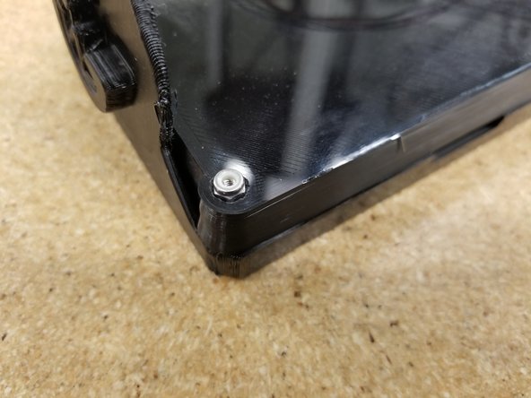 Use the M3 Nylon Lock nuts and the M3 22mm SHCS bolts to combine the two halves of the bezel.