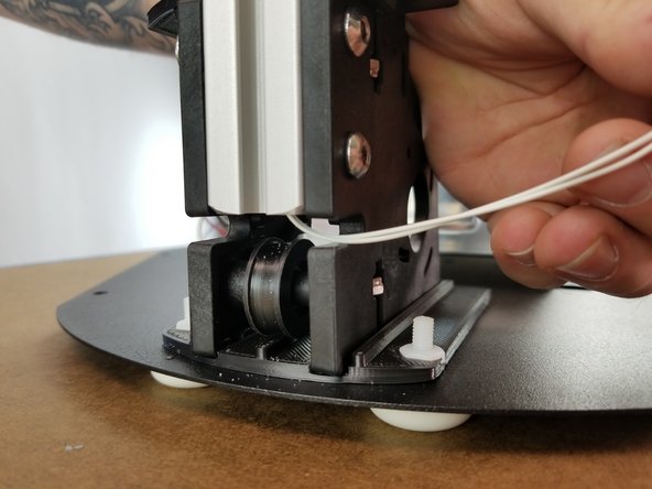 Feed the wires all the way down and out the bottom of the extrusion and bring them out the side as shown in Pic 2.