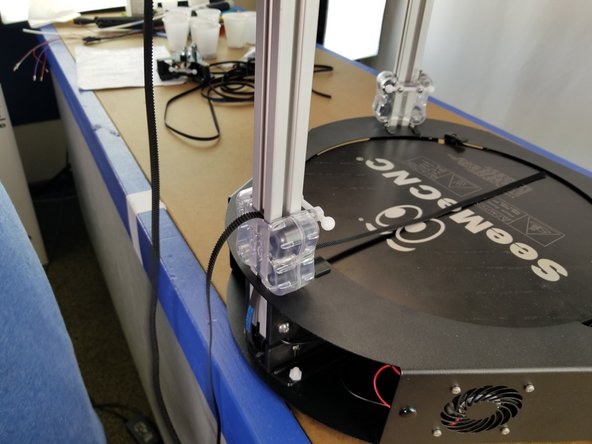 Also bring the belt along the extrusion behind the carriage as shown in Pics 1 and 2.