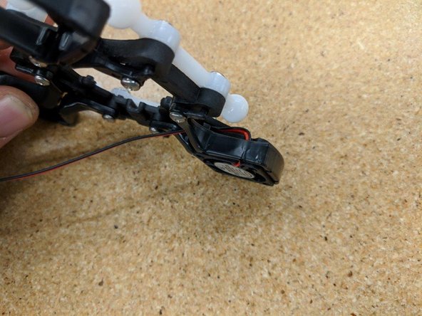 Make sure to carefully route the power wires for the fan as they are in the images.