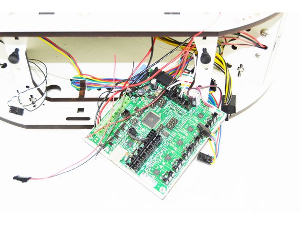 Locate the Red and Black 26awg wire that you cut from the Hotend Whip. These wires are already inserted into a 4 pin latching housing.