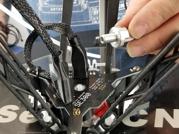 The PTFE liner inside the hotend chamber might come out with the PTC assembly. If this happens, just insert it back in place