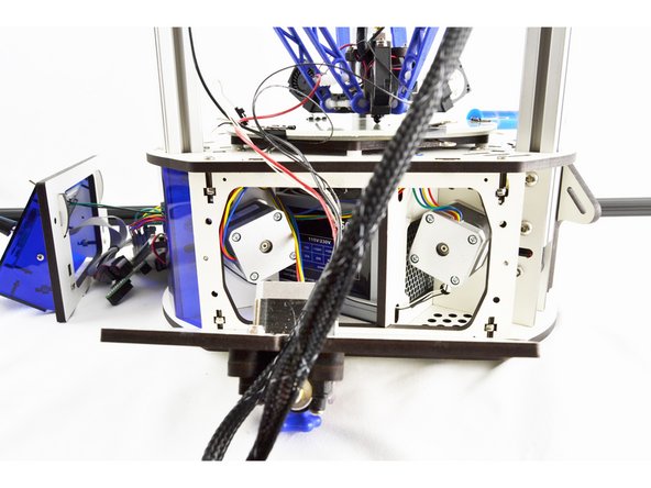 Pull the wires from the existing hotend whip through the base assembly, out the side with the extruder panel (removed)