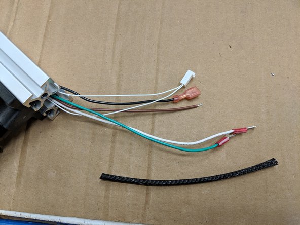 You will feed from the bottom of the tower (opposite the stepper motor). Feed the following: 18awg white and green wire with ring terminal, 18awg black wire with straight spade terminal, 18awg wire with NO terminal.