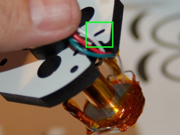 Tie the wires to the strain relief using a 4&quot; wire tie in the notch shown.