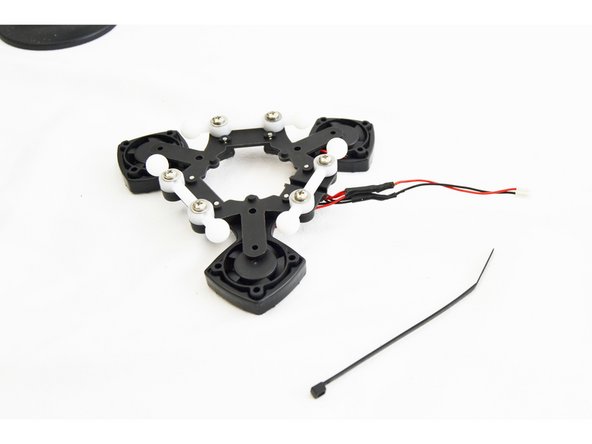 If you have received a REV6 accelerometer board, this step is NOT required. There is a connector for each fan on the board. After you get the hot end installed on the platform in step 56, you will find the best routing for the fan wires.