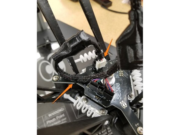 Plug in the white 2 pin connector and black 4 pin connector.