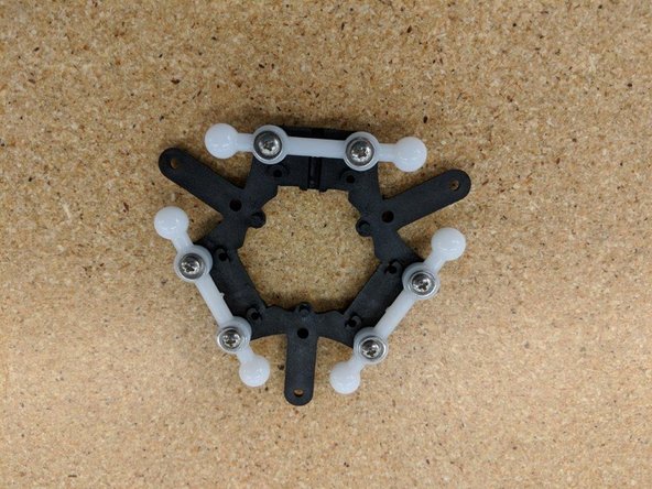 For this task, you'll need the three layer fan mounting brackets, the assembled effector platform,  and six #4, 3/8&quot; screws