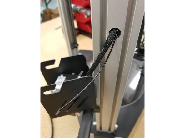 Tape the new whip wires to the end of the filament line. You may need to tape it in multiple places to make sure it's attached well. You don't want to lose your wires in the tower and start all over again.