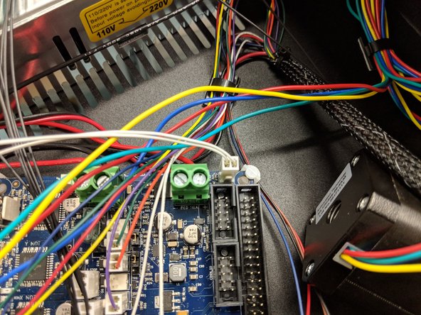 The bed thermistor connector (2-pin with 2 white wires, exiting the Z tower wire bundle) is keyed and will only plug in one direction in the location shown in the photo.