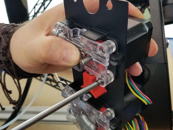 Use the included 30449 M3 - 0.5x 10mm L Phillip Pan Head Machine Screws to attach the EZR Struder and stepper motor to the extruder plate