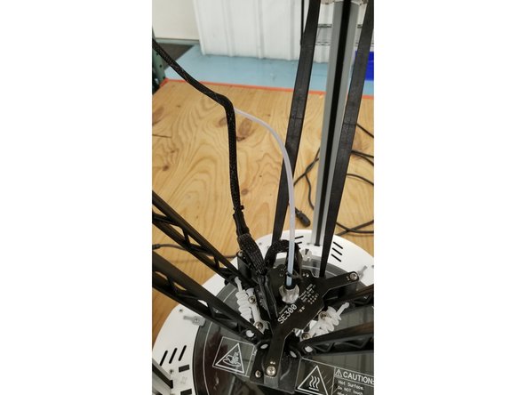 It's recommended to pull the PTFE tube back and exit it from the mesh loom further up the whip after performing this change.