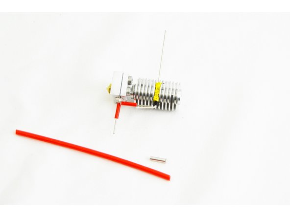 Locate one of the Non-insulated Wire Ferrules (26222) and the 55mm long Red Silicone High Temp Insulation (26191).
