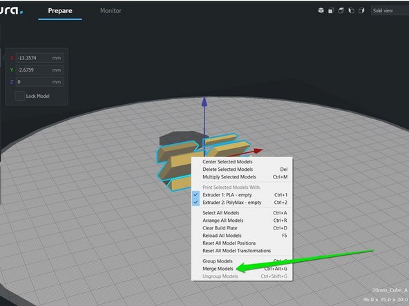 When loaded, both items will be assigned to the main extruder (Ext 0).  We will click on the part you want to be the second color and click the circle with the 2 on the left. This will make that model slightly darker color indicating it is for the second extrduer.