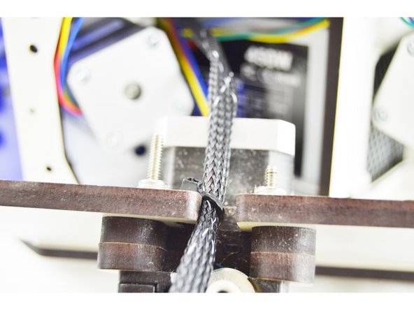 Clip the excess portion of the cable tie.