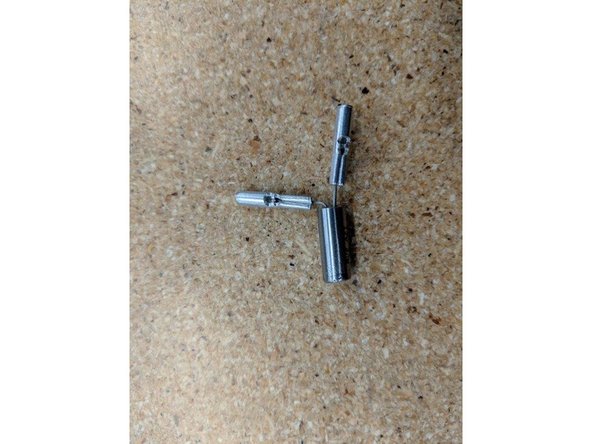 Place the first crimp on one leg of the cartridge. The leg of the cartridge will go to the mid point of the crimp shown.