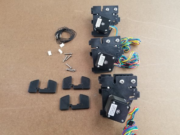 This section will use the 3 idler brackets with motors installed that were made at the beginning of the guide.  You will also use 3 small shims, 6x 6-32 x 7/8&quot; long philips screws, 6x black endstop wires with pre-crimped connectors, and 3x 3 pin white connectors.