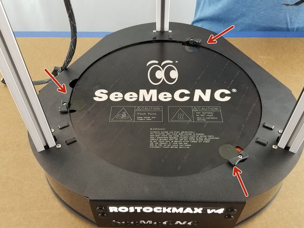 You will place one sticker directly to the bed just in front of the bed clamp as shown in Pic 3.