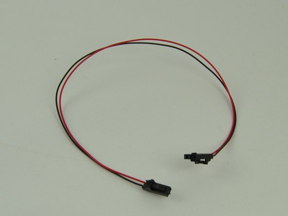 Route the 5v Wire Harness through the same holes. The three pin connector needs to be on the side closest to the fan.