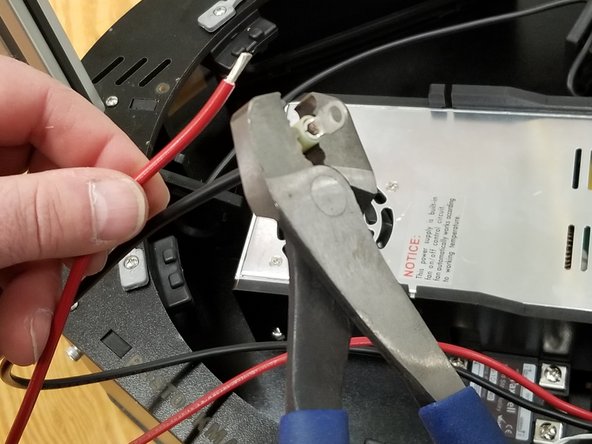 Strip 1/4&quot; off the end of each of the existing black and red 12awg bed wires that were previously snipped.