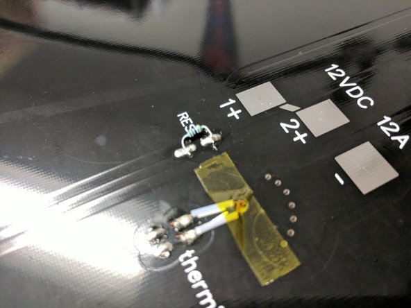 You can cut the excess resistor leads after you have soldered it to the bed.