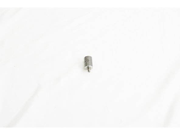 Screw the heat break into the heat sink.  The heat sink is symmetrical, so either end is OK.