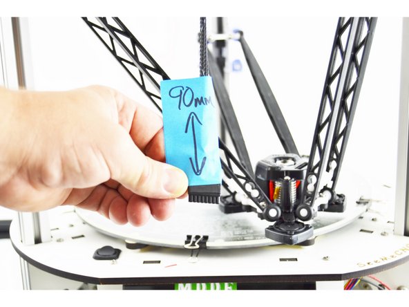 The bowden tube gets installed approximately 90mm from the end of the hot end whip. Measure from the end of the 8 position pluggable connector.