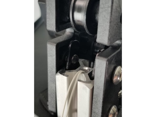 Line the T-Nuts up with the extrusion so the extrusion can slide all the way down on the brackets as shown in Pic 1.  You may need to loosen the bolt and T-Nut to get it to side into the extrusion.