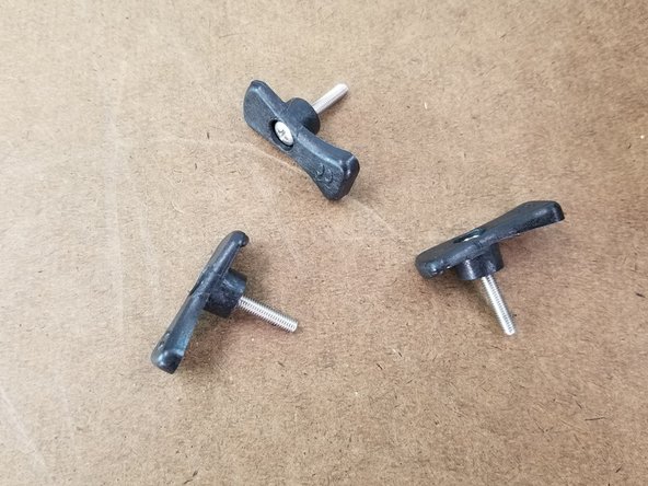 Place the M3 x 18mm long screws through the build plate clamps as shown in Pic 2.