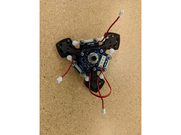 Take special care not to trap a fan lead under a screw head!