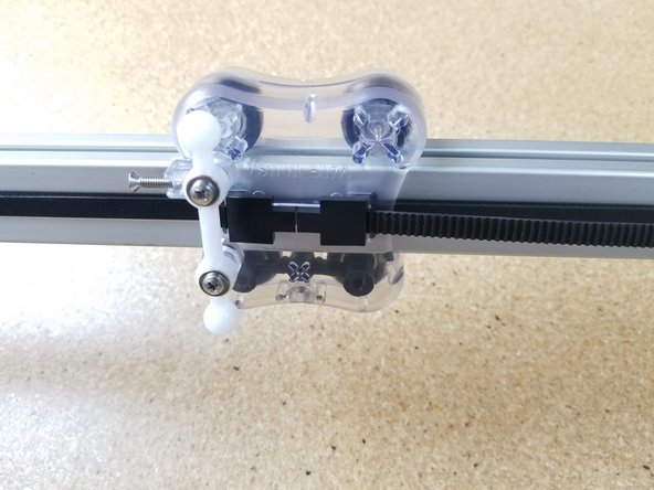 Route the belt as shown in the diagram on step 31