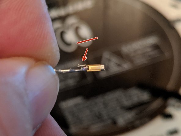 You can see in Pic 1 the small tab that has now been compressed.  Using a fingernail, GENTLY lift the tab so it can click back into place when re-inserted.