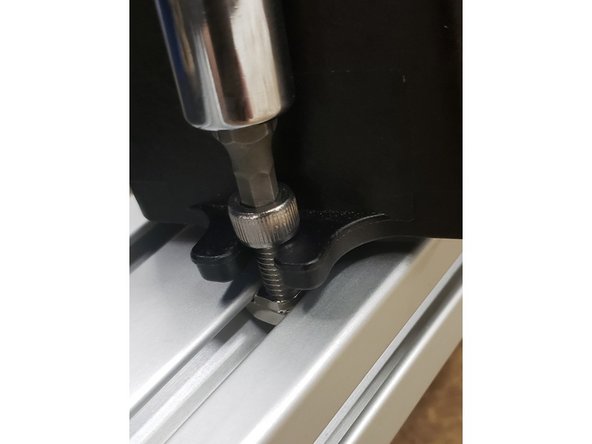 Same process to actuate the quarter-turn nut. Lift and turn.