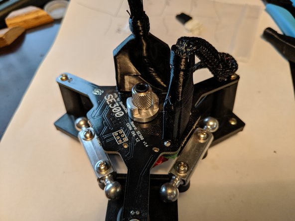 Slide the boots down to cover the plugs as shown in Pic 2.