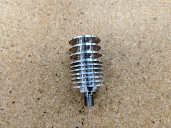 Screw the heat break into the heat sink into the side with multiple closer fins as shown in pic 2.