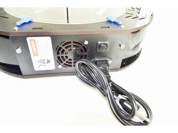 The power supply in the printer is shipped in the 110 (115) position.