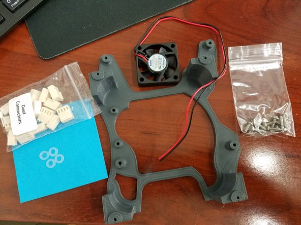 The next step is installing the 3D Printed Duet Standoff. For this step you will need the 40mm fan you previously removed from under the Rambo, your 3D printed Duet standoff, the small hardware bag containing 10 screws, and the 4 Nylon washers from the Duet Connectors bag located in your Duet WiFi box.
