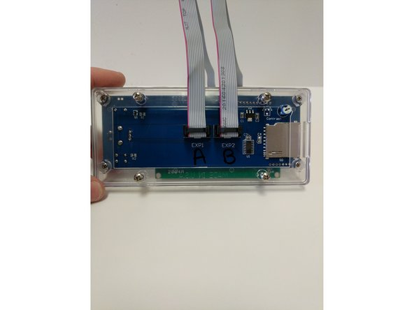 Install the Ribbon cables in the connectors on the back of the LCD Controller. These connections are Keyed.